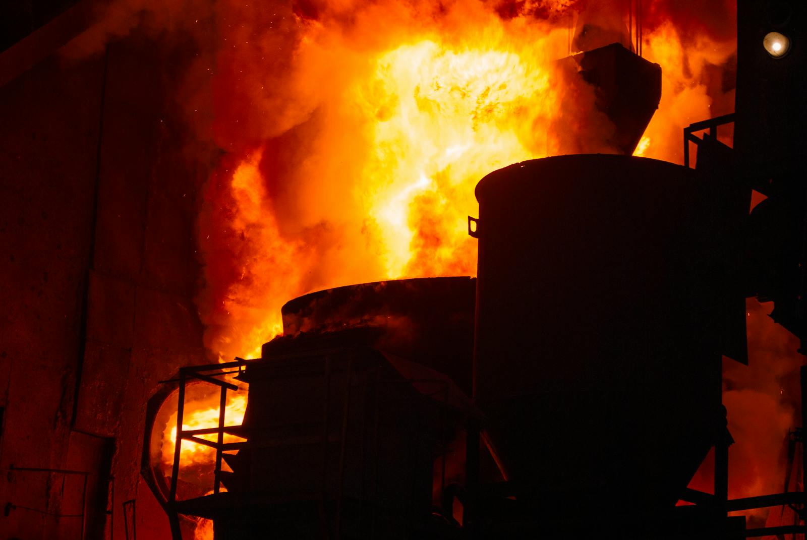 Induction furnace melting steel scrap